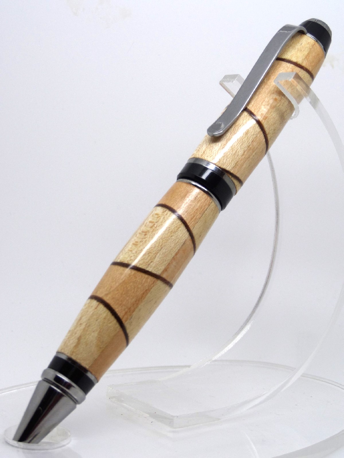 Masur birch and a segmented design cigar pens