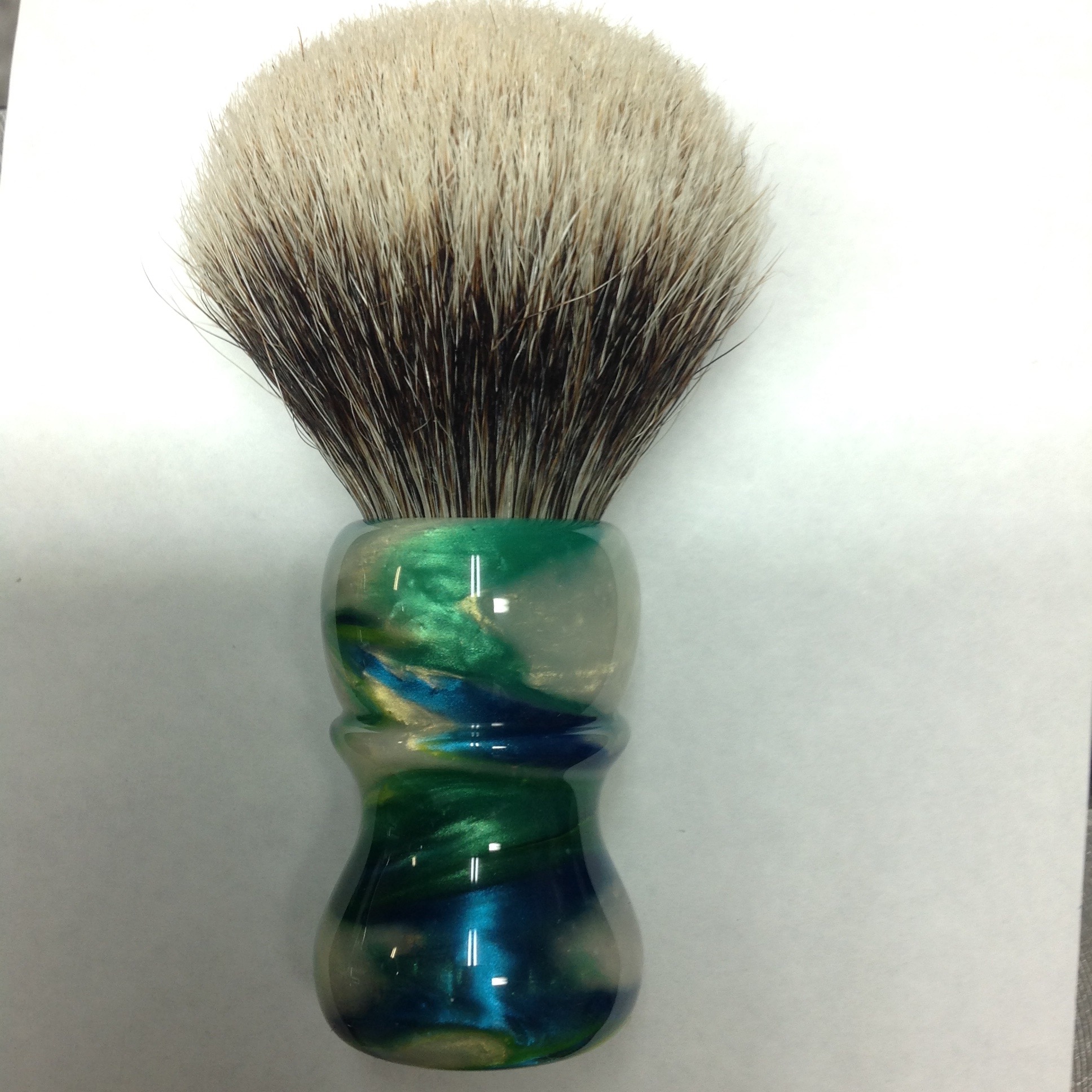 Pearl, green, blue, and yellow shaving brush