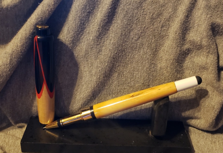 Pool cue rollerball