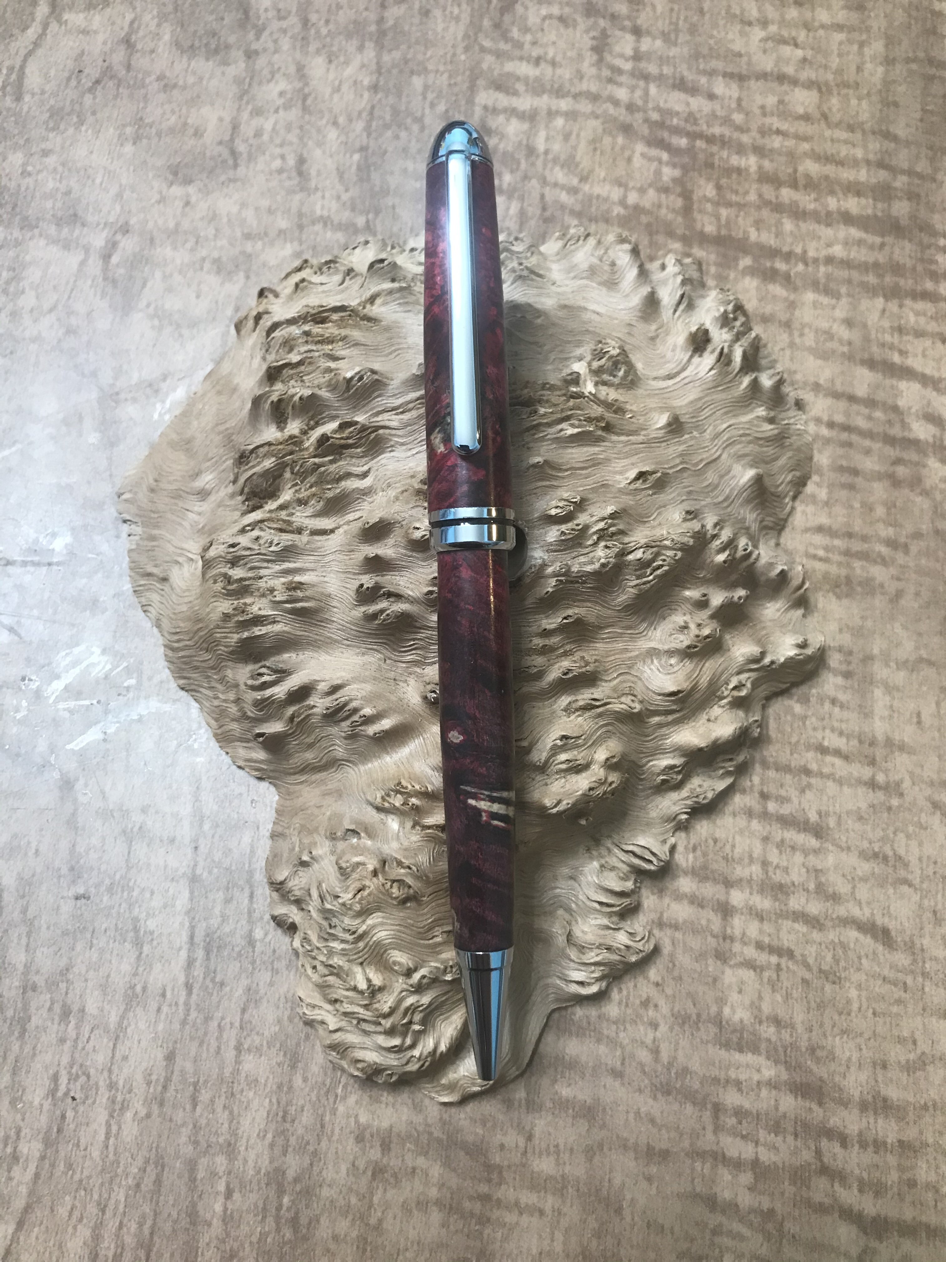 Red Dyed (black & yellow) Buckeye Burl on a Chrome Designer Twist Pen