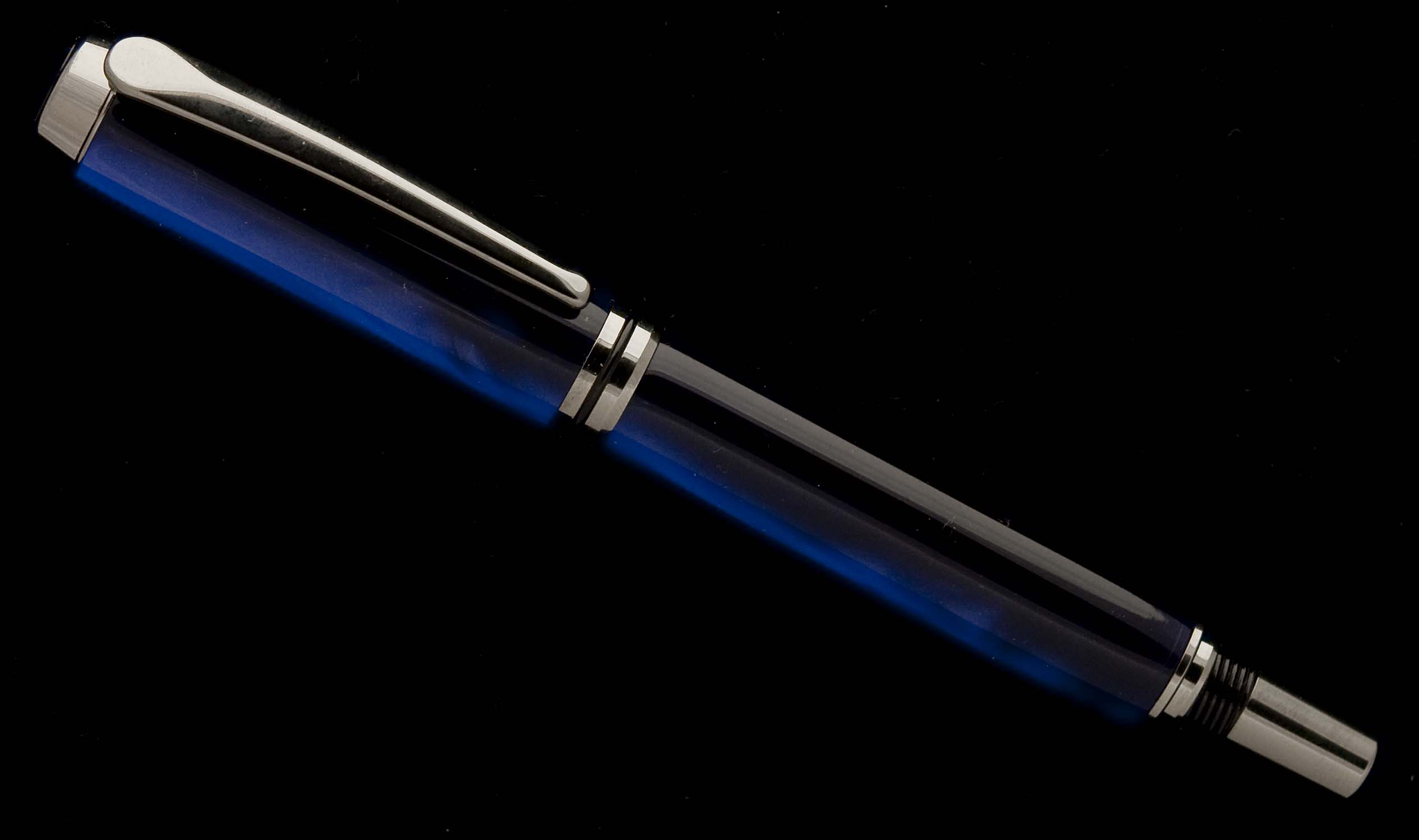 Royal Blue Madreperlato on Black Titanium Navigator