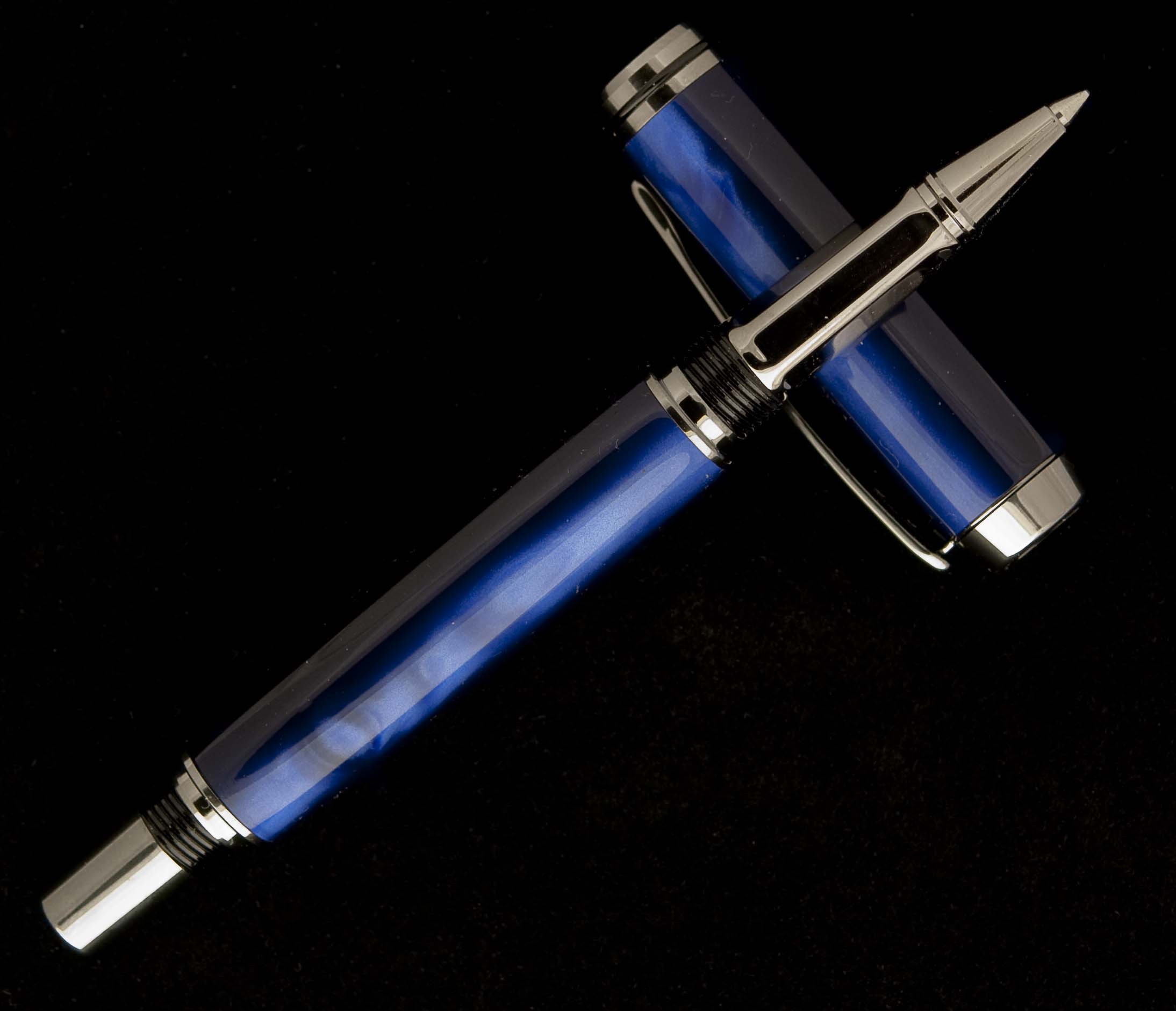 Royal Blue Madreperlato on Black Titanium Navigator