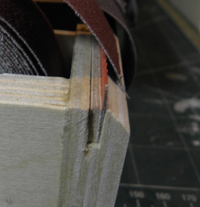 Sandpaper caddy tear-off attachment