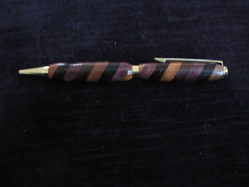 Segmented pen of Purple Heart, Nogal, Jotoba, Wenge, Santos Mahogany