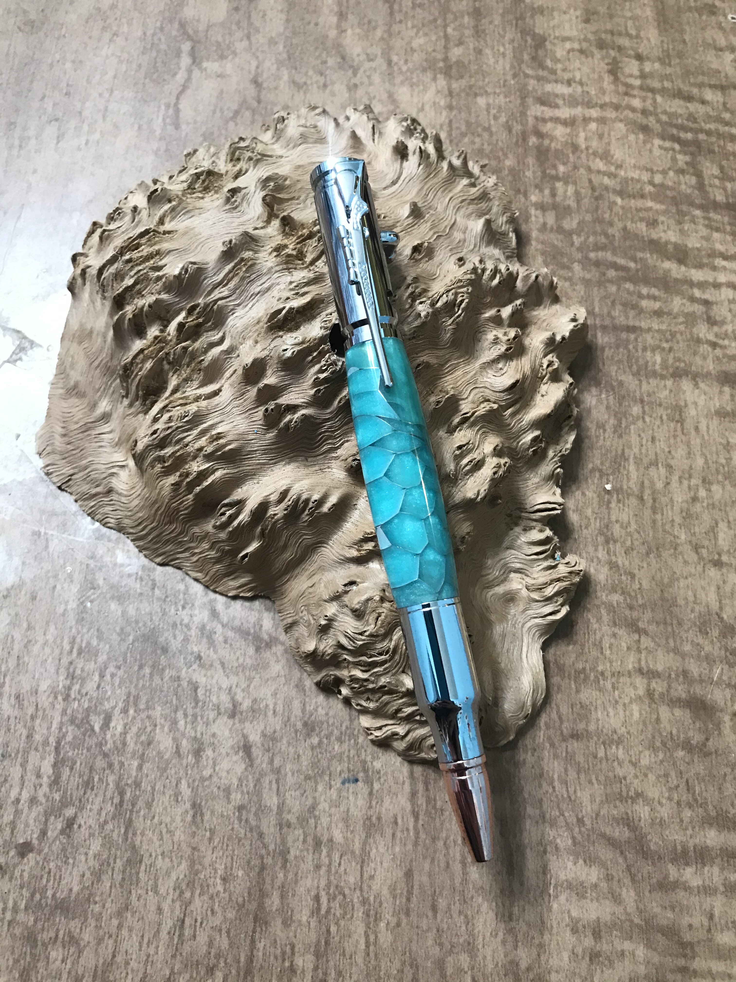 Sky Blue resin and Aluminum honeycomb on a Chrome .30Cal Bullet Bolt Action Pen