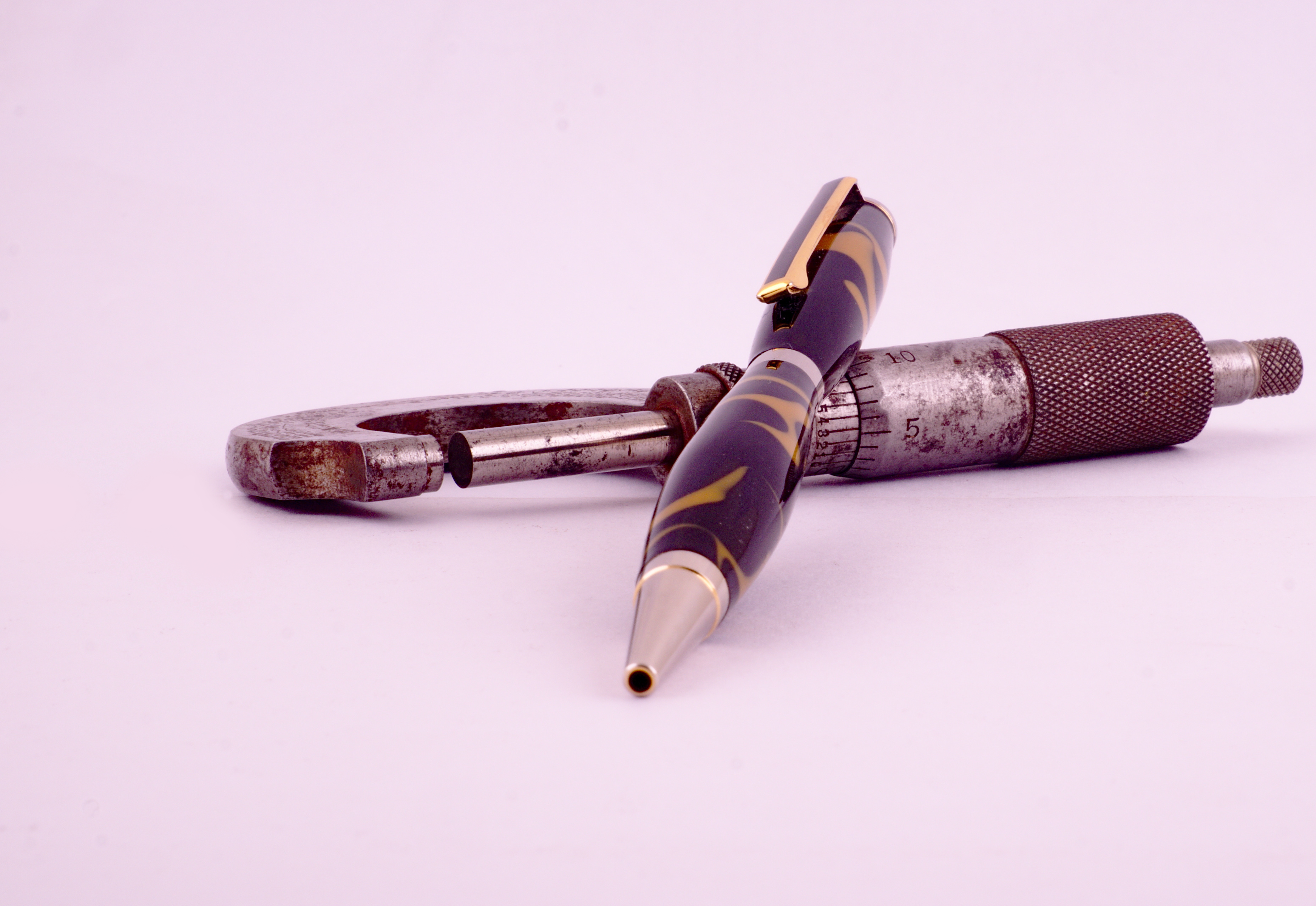 Slim Line in light box with old caliper