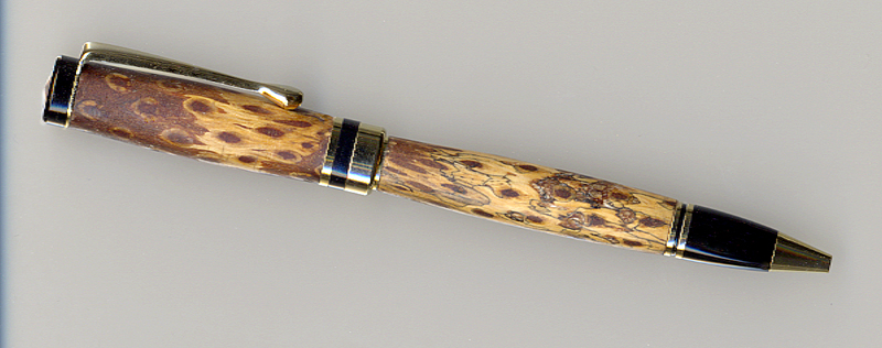 Spalted pinecone flat top pen.