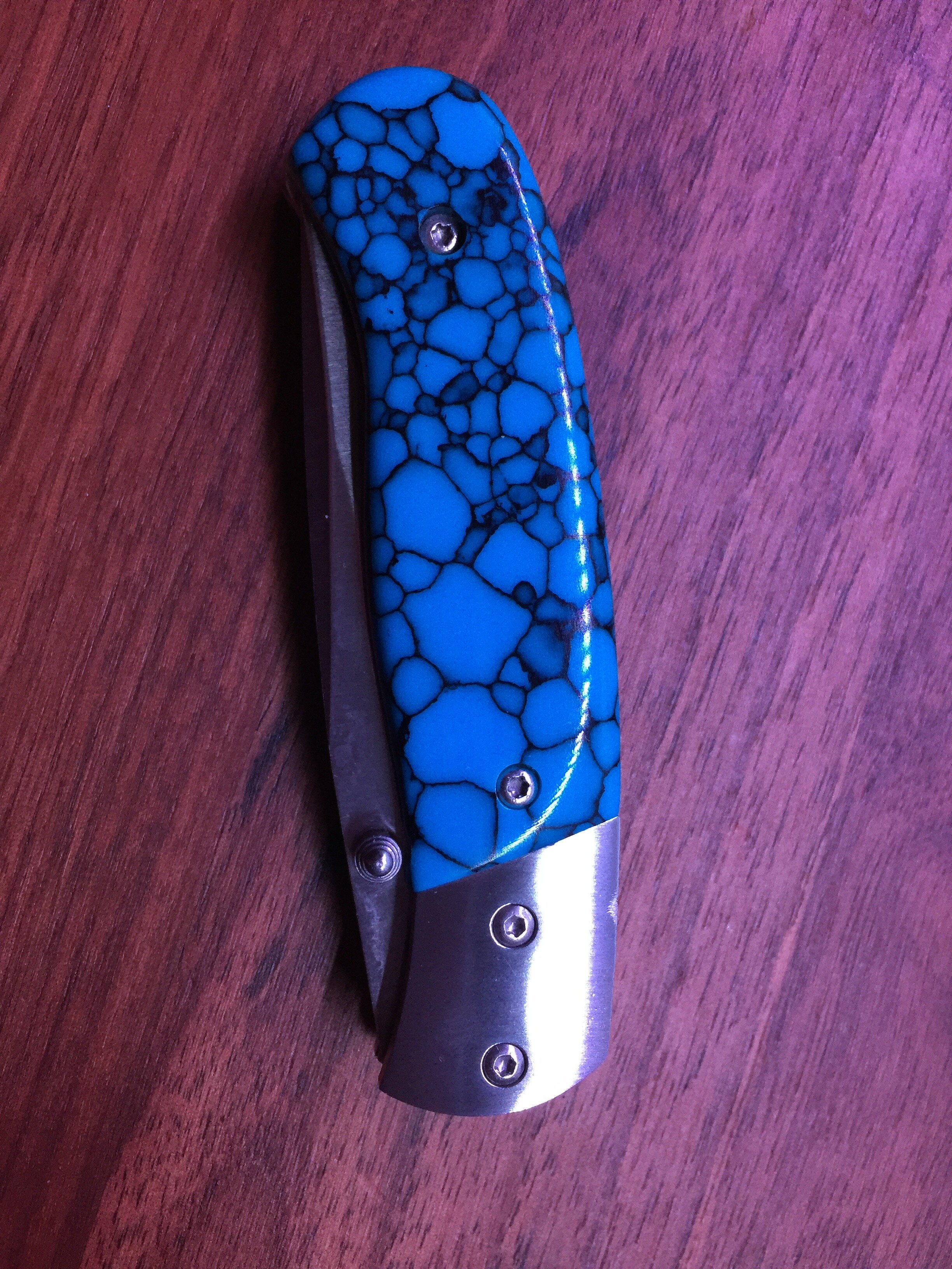 stainless and turquoise trustone linerlock.