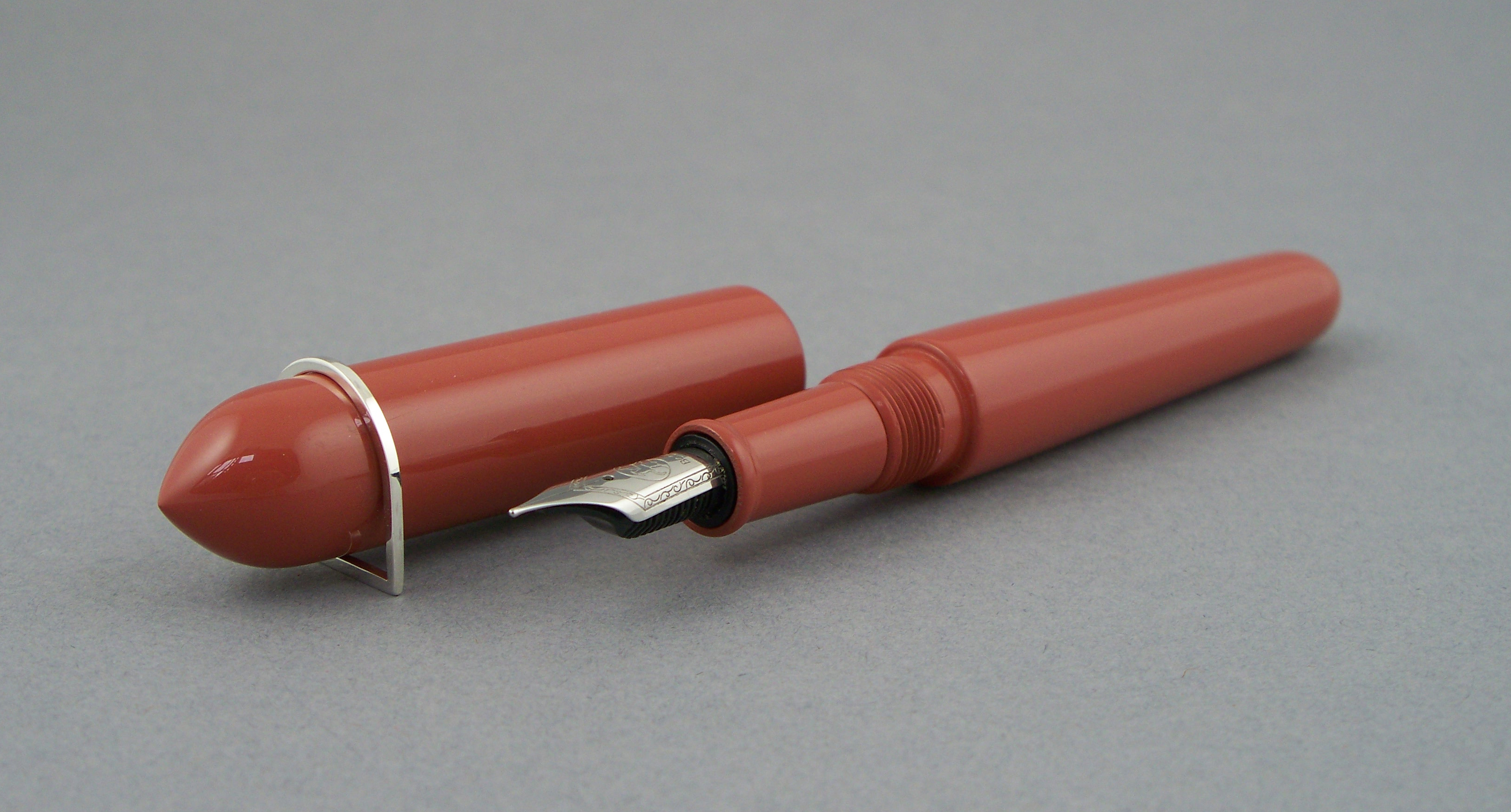 Streamline model pen with silver rollstopper