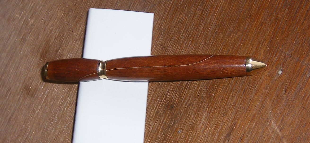 Thick mahogany pen with brass inlay and home turned brass furniture I