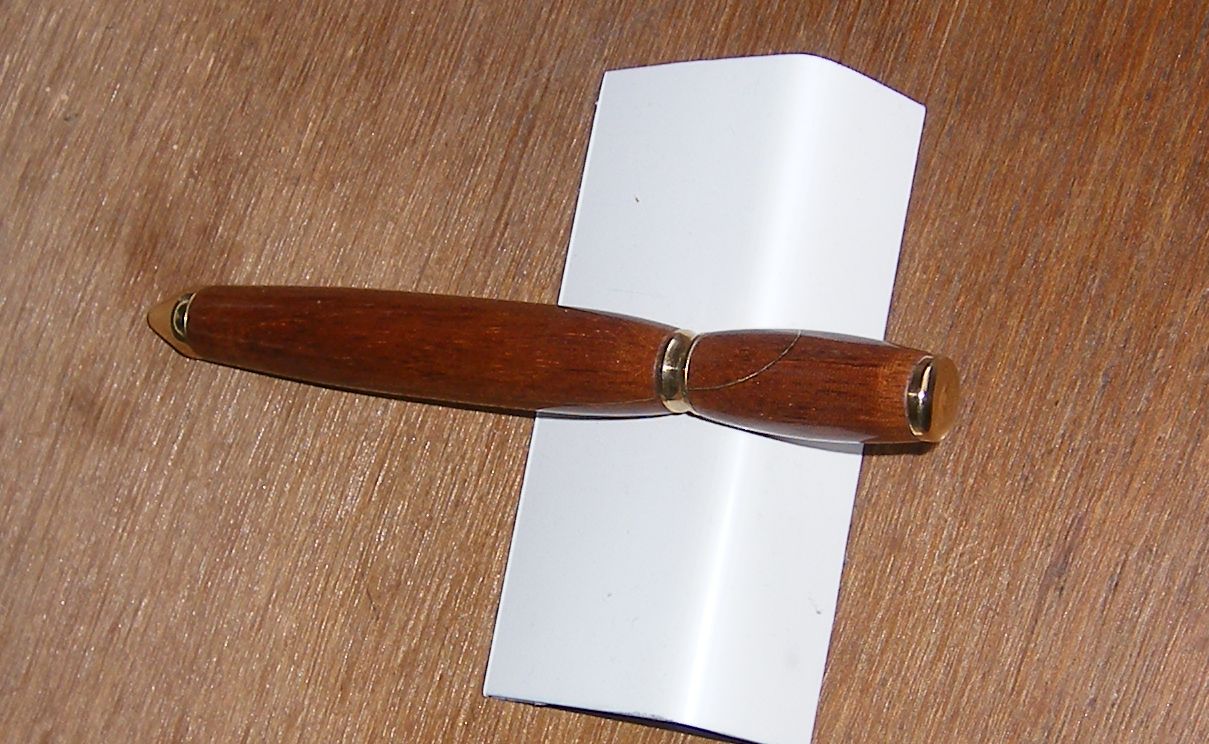 Thick mahogany pen with brass inlay and home turned brass furniture II