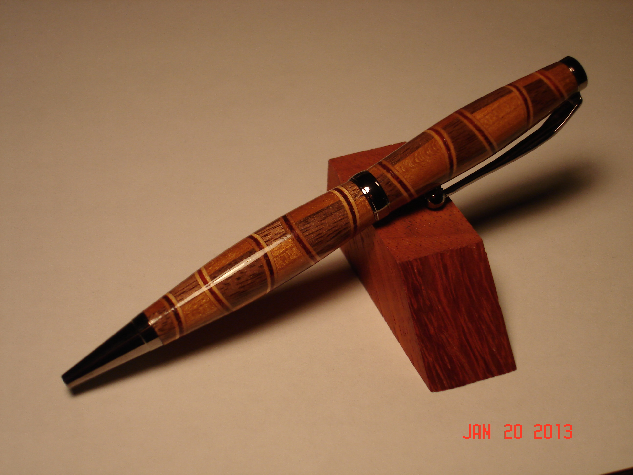 Walnut / Cherry segmented pen with titanium hardware