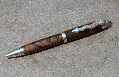 Walnut cigar with silver snake clip