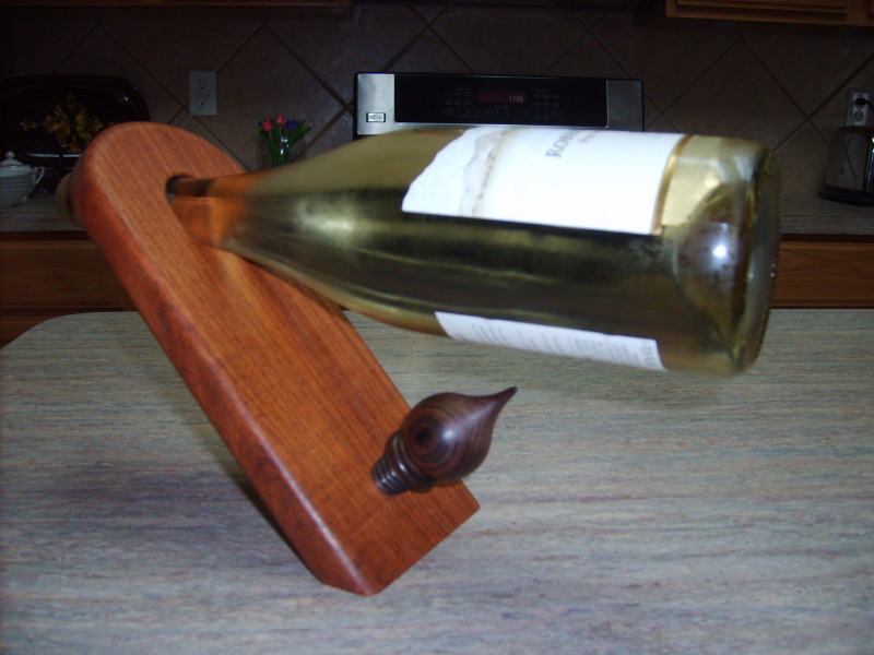wine bottle holder with stopper